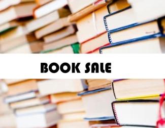 image of many books and book sale sign