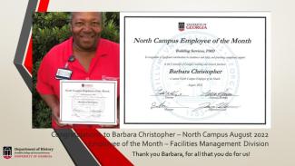 photo of Barbara Christopher with award certificate