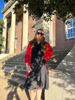 Doctoral candidate Theodora Light in front of UGA's LeConte Hall