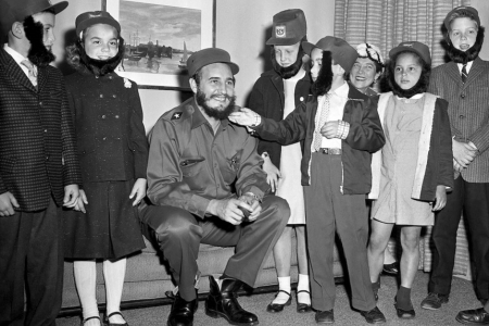 Photo of Cuban leader Catro and children wearing fake beards