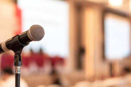 Photo of microphone in a lecture hall