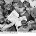 People look at Washington, DC, newspapers on September 1, 1939—the day Nazi Germany invaded Poland, starting World War II. Harris & Ewing Collection/Library of Congress