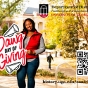 UGA student with Dawg Day of Giving Sign