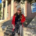 Doctoral candidate Theodora Light in front of UGA's LeConte Hall