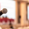 Image of a microphone in a lecture hall